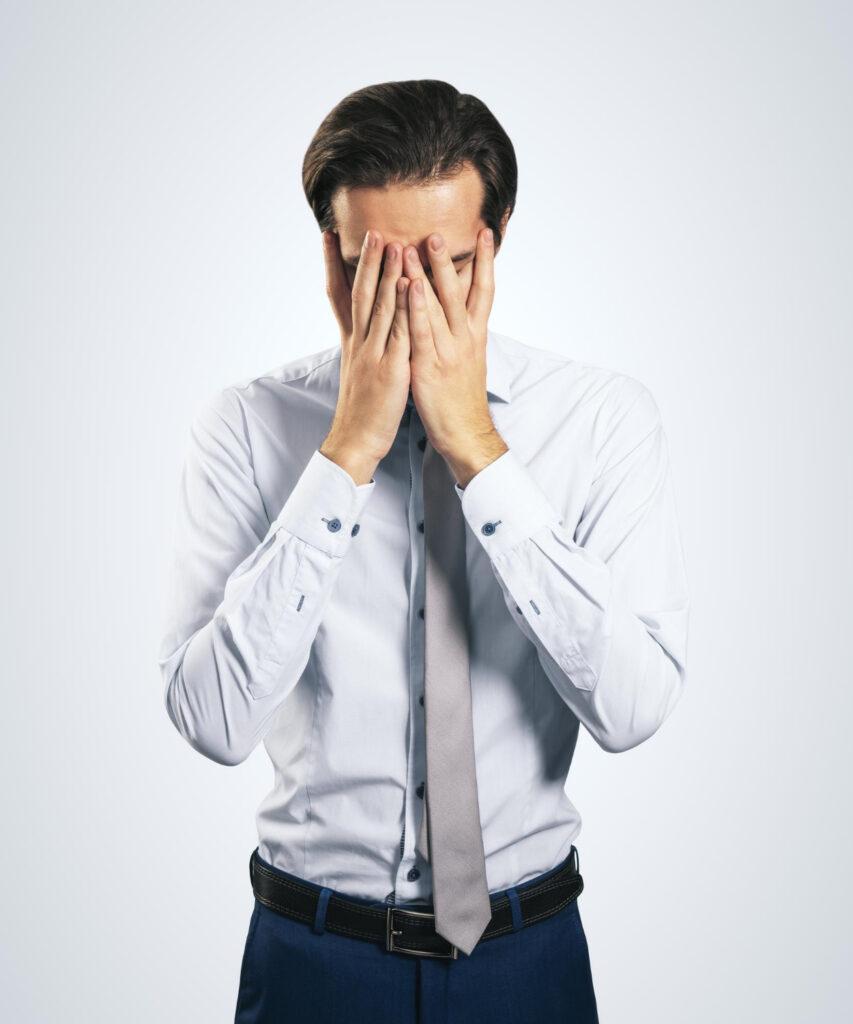 stress-find-solution-concept-with-man-white-shirt-closing-his-eyes-facepalm-shame